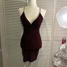 This Is A Size Xs Honey And Rosie Dress From Dillards, And Was Never Worn. The Material Is Super Stretchy And Comfortable, Has Built In Bra Pads, Does Not Ride Up When Walking, And Is A Perfect Dress For A Formal Occasion. ( Homecoming ) Fitted Burgundy V-neck Dress, Fitted Burgundy Flirty Dress, Burgundy Sleeveless Mini Dress For Evening, Burgundy Sleeveless Evening Mini Dress, Fitted Burgundy Dress For Homecoming, Fitted Burgundy Dress With V-neck, Burgundy Fitted Homecoming Dress, Red V-neck Bodycon Dress For Party Season, V-neck Midi Dress For Holiday Party