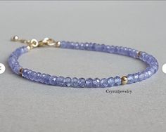 Tanzanite bracelet, blue and gold gemstone jewelry, gift for women, stackable gemstone bracelet Chakra bracelet AAA Quality Please Feel Free To Contact If You Have Any Query. Orders are shipped within 1 business working day, excluding orders made on Sunday or national holidays. Domestic delivery takes 5-7 business days. International delivery takes 11-23 business days. PAYMENT METHOD : PayPal only Please send all payments within 7 days . Return policy: We are very confident on our fine jewelry will meet your expectations, your satisfaction is our priority. However, if for any reason you are not satisfied with our product, you may return your order within 14 days from the date of shipment. The item must be returned in its original condition and return delivery charges will be paid by buyer. Blue Stackable Beaded Bracelets As Gift, Blue Gemstone Bracelets For Everyday Wear, Elegant Blue Stackable Crystal Bracelet, Dainty Blue Bracelets With Natural Stones, Dainty Blue Gemstone Beaded Bracelets, Blue Dainty Gemstone Beaded Bracelet, Blue Faceted Beaded Bracelets For Gift, Blue Faceted Beaded Bracelets As Gift, Faceted Blue Beaded Bracelets As Gift