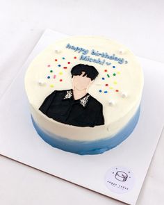 a birthday cake with an image of a woman on it