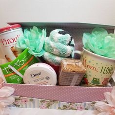 This is a cozy gift basket will bring joy to any one.  The gift basket consist of: - coffee mug (let me know the occasion when ordering) - 1 pair of fuzzy cupcake socks indivially wrapped in cellphone paper with a bow - 1 can of Pirouline dark chocolate wafer rolls - 1 small jar of Dove moisturizing body creme - 1 package of cookies - 1 artifical flower - 1 floral reusable gift box Cozy Gift Basket, Cupcake Socks, Wafer Rolls, Get Well Gift Baskets, Healing Message, Sock Cupcakes, Chocolate Wafer, Body Creme, Surgery Gift