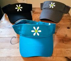 Our most popular designs are now on visors! These are a must have for all pickleball players. 2 STYLES!! (Washed Cotton AND Moisture Wicking polyester) COTTON: These 3-panel visors have a self-fabric sweatband. *Fabric: 100% washed cotton twill; 80/20 poly/cotton *Closure: Hook and loop, velcro MOISTURE WICKING: A moisture-wicking colorfast visor *Fabric 100% polyester *Closure Hook and loop, velcro Sporty Breathable Visor For Spring, Sporty Spring Sports Visor, Sporty Spring Outdoor Visor, Spring Sports Visor With Adjustable Fit, White Sports Visor For Spring, White Spring Sports Visor, Spring Sports White Visor, Casual Golf Visor For Summer, Casual Summer Golf Visor