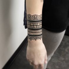 a woman with a tattoo on her arm