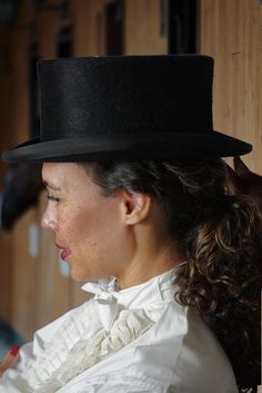 This smart, top-quality traditional dressage hat is made by specialist hatmakers.  This black vintage 1970s/1980s dressage hat is from Christy's London the world's oldest milliners (established in the 1700s). Made of high-quality fur felt - Shiny top layer for a luxurious look - Height of 10 cm - Equipped with a flat point of the shoulder - Timeless design -  This top hat is beautifully made in natural wool felt, with the perfect elegant shape, well-fitted, secure, and comfortable. Made for a real horse lover. It has a stylish 4 1/4in crown and a fully lined grosgrain ribbon band. Label"  Measures:  Condition: Vintage Deadstock. Shipped in original box. The box is in good/fair condition Check out more hats at our link below https://www.etsy.com/shop/BuffaloGalVintage?ref=hdr§ion_id=1807774 Show Horse, English Riding, Riding Hats, Black Vintage, Dressage, Top Hat, Horse Lover, Horse Riding, Vintage 1970s