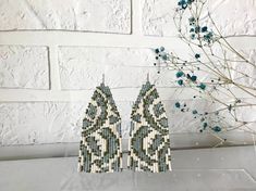 "These green and beige beaded earrings are made from selected Czech beads. Fringe beaded earrings can be an excellent personalized gift for bridesmaids, Mother's Day, Birthdays, Valentine's Day, Wedding Day, Christmas, New Year, and for your loved ones. ♡ Length - 4\" (10.5 cm) ♡ Width - 1,6\" (4 cm) ♡ Quality Czech beads ♡ Stainless steel or 925 silver hooks The colors can slightly differ from the photo because of photography lighting and monitor settings. ♥Gift packaging - FREE! NOTE: Before you pay, please make sure the address in your order matches the address you would like me to ship. ♥ Back to my shop: https://www.etsy.com/shop/BohoBeadRoom My Instagram @boho.bead.room" Bohemian Beige Beaded Earrings For Gifts, Handmade Cream Beaded Earrings, Beige Beaded Earrings With Dangling Beads As Gift, Handmade Cream Beaded Drop Earrings, Beige Beaded Earrings With Dangling Beads For Gift, Handmade Cream Beaded Earrings With Round Beads, Bohemian Beaded Beige Earrings, Beige Beaded Bohemian Earrings, Colorful Beaded Earrings As Gift