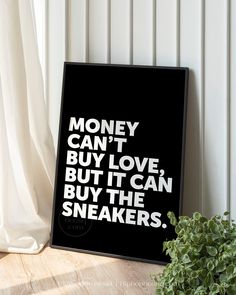 a black and white poster that says money can't buy love but it can buy the sneakers