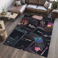 a living room filled with furniture and a large rug covered in stickers on the floor