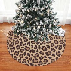 a leopard print christmas tree skirt on the floor