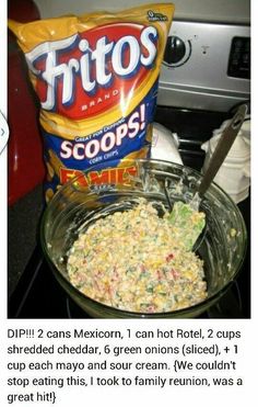 a bowl filled with food next to a bag of chips