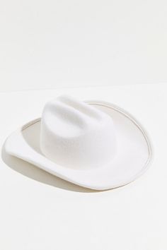 So chic western-inspired hat featured in a classic cowboy shaped silhouette with a cattleman crease crown, upturned brim, and interior ribbon adjuster for a so-perfect-fit. * Interior sweatband * Adjustable fit * Structured style | Cash Cowboy Hat by Wyeth at Free People in White White Cowboy Hat, Classic Cowboy, Cool Street Fashion, Cowboy Hat, Hat Shop, Boho Clothing, Playing Dress Up, Who What Wear, Hat Fashion