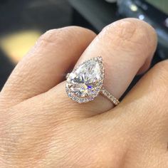 Description: BEAUTIFUL 14K ROSE GOLD LADIES ENGAGEMENT RING. THIS ITEM IS NEW. COMES WITH GIFT BOX. WE DO OFFER FREE SIZING. IF YOU HAVE ANY OTHER QUESTIONS PLEASE CONTACT US. ALL THE INFO ON THIS ITEM DOWN BELOW. THANK YOU VERY MUCH. KATE . Metal: SOLID 14K ROSE GOLD Stamped: 14K Total Gram Weight: 3.8GR Ring Size: 6.75 (RESIZEBLE) Setting: PRONG WidthTop: 16.1MM (HALO), 1.8MM (BAND) Width Bottom: 1.7MM Side Stones: 100% NATURAL DIAMONDS Color: F Clarity: VS2-SI1 Shape: ROUND BRILLIANT CUT Cara Dazzling Pear-shaped Gia Certified Rings, Luxury Gia Certified Pear-shaped Wedding Ring, Gia Certified Marquise Cut Cubic Zirconia Wedding Jewelry, Gia Certified Marquise Cut Cubic Zirconia For Wedding, Exquisite Pear-shaped Gia Certified Rings, Gia Certified Teardrop Diamond Ring For Formal Occasions, Gia Certified Teardrop Ring For Anniversary, Gia Certified Pear-shaped Ring For Anniversary, Gia Certified Pear-shaped Diamond Promise Ring