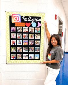 a woman standing next to a bulletin board with instagram pictures on it in a hallway