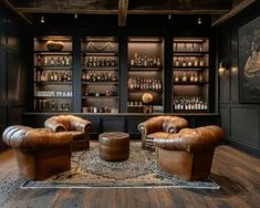 a living room filled with lots of leather furniture