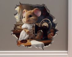 a wall sticker depicting a mouse sewing on a sewing machine and holding a spool of thread