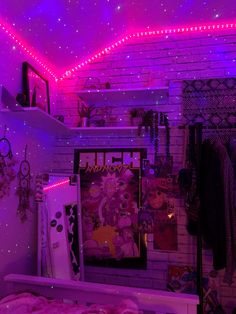 the room is lit up with purple lights and pictures on the wall, along with other decorations