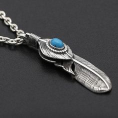 Men's Sterling Silver Turquoise Feather NecklaceMetal Type: 925 Sterling SilverMain Stone: TurquoiseGender: For MenStyle: VintagePattern: A / BPendant Size: 14 mm (w) * 67 mm (h)Pendant Weight: 14.7 gChain Type: Sterling Silver Anchor Link ChainChain Width: 3 mmLength: 18 in / 20 in / 22 in / 24 in / 26 in / 28 in / 30 inMinimum Order: 1 Feather Necklaces, Sterling Silver Mens, Metal Necklaces, Vintage Pattern, Silver Turquoise, Turquoise Sterling Silver, Types Of Metal, 925 Sterling Silver, Turquoise