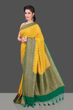 Buy beautiful yellow georgette Benarasi saree online in USA with green zari border. Shop beautiful Banarasi sarees, georgette sarees, pure muga silk sarees in USA from Pure Elegance Indian fashion boutique in USA. Get spoiled for choices with a splendid variety of Indian saris to choose from! Shop now.-full view Georgette Banarasi Saree, Muga Silk, Banarasi Sari, Pure Georgette Sarees, Saree Floral, Indian Designer Sarees, Designer Sarees Online, Buy Sarees Online, Banarasi Saree