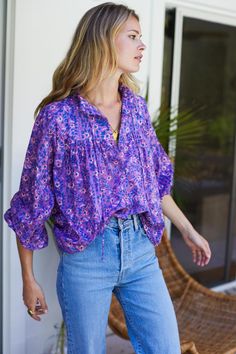 Emmaline Blouse - Violet Wildflower Organic - Emerson Fry Casual Purple Blouse 3/4 Sleeve, Casual Purple Blouse With 3/4 Sleeves, Purple 3/4 Sleeve Blouse For Spring, Purple Cotton Blouse With Relaxed Fit, Casual Tops With Blouson Sleeves And Tie Neck, Purple Relaxed Fit Blouse For Daywear, Purple Relaxed Fit Blouse, Casual Blouse With Blouson Sleeves And Tie Neck, Spring Purple Blouse With Relaxed Fit