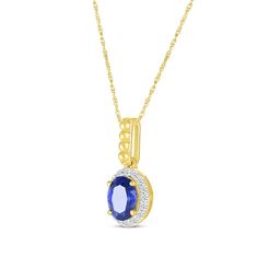 She'll adore the classic and modern touches in this bright and sparkling necklace. Crafted in 10K yellow gold An oval-cut blue lab-created sapphire is the stunning centerpiece A halo of white lab-created sapphires adds sparkle The beaded bail lends a touch of whimsy to the look Te 18-inch rope chain secures with a spring ring clasp Sapphire Oval Necklace With Diamond Cut, Oval Sapphire Necklace With Diamond Cut, Oval Blue Diamond Cut Necklace, Blue Oval Diamond Cut Necklace, Oval Blue Diamond Necklaces, Blue Oval Diamond Necklaces, Blue Oval Pendant Necklace With Diamond Cut, Blue Oval Pendant Necklace With Diamond Accents, Blue Diamond Oval Pendant Necklace