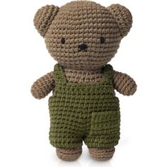 a crocheted teddy bear with green overalls