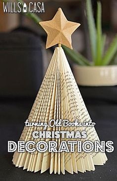 an origami christmas tree decoration made out of book pages with the words, turning old books into christmas decorations