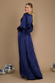 Are you trying to find the ideal long dress that will make you feel both gorgeous and at ease? Check out this gorgeous long-sleeved formal dress! It has a chic split a-line skirt that will accentuate your attractive legs, a trendy and elegant peplum-style bodice, and romantic long sleeves. Elegance, beauty, and comfort are personified in this outfit. Excellent for any special event! Fabric: Satin Length : Full Length Sleeve Style : Long Sleeve Color : Black, Navy Sizes : 8, 10, 12, 14, 16, 18, 2 Party Evening Dress With Side Slits In Satin, Fitted Satin Long Sleeve Party Dress, Maxi Length Evening Dress With Side Slits For Party, Fitted Long Sleeve Floor-length Dress For Night Out, Long Sleeve Satin Dress For Date Night, Blue Long Sleeve Party Dress For Fall, Long Sleeve Dressy Dress For Prom Season, Blue Long Sleeve Dress For Fall Party, Long Sleeve Dressy Prom Dress