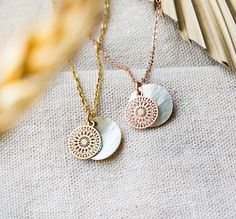 "OCEANCHILD" Filigree necklace in rose gold colour, with a geometric pendant in front of a mother of pearl disc. ≫ Dimensions: Pendant: approx. 15 mm Length of chain: 43 cm ≫ Material: Mother of pearl disc, chain available in stainless steel rose gold colored or 925 sterling rose gold colored (18K coated - 40 cm). ≫ Colors: Rose Gold ≫ Manufacturing method: High quality jewelry material put together. Please note that the mother of pearl disc may vary as it is a natural product and each one is un Rose Gold Medallion Pendant Necklace As Gift, Rose Gold Pendant Medallion Necklace As Gift, Mother Of Pearl Engraved Necklace For Gift, Engraved Mother Of Pearl Necklaces For Gifts, Pearl Pendant Medallion Necklace In Mother Of Pearl, Mother Of Pearl Medallion Necklace With Pearl Pendant, Engraved Mother Of Pearl Pendant Necklace, Rose Gold Medallion Necklace, Rose Gold Medallion Necklace With Delicate Chain