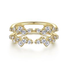 two yellow gold rings with diamonds on them