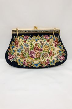 ❁ Stunning Vintage (around 1940's ) Tapestry (carpet) Handbag or Evening Bag. ❁ It is a tapestry style bag with a "snake" chain handle - and a gold-tone clasp closure, as photographed.  ❁ Beautiful vintage roses floral tapestry embroidered needlepoint evening bag same pattern both sides and pattern around trim brass frame has texture pattern to it ❁ Measurements taken at widest points  25 cm. x 16 cm. ❁ In excellent condition inside and out,  A lovely example - which looks like it has been store Vintage Tapestry Bags For Gifts, Antique Tapestry Evening Bag, Handmade Tapestry Evening Bags, Handmade Tapestry Bags For Evening, Vintage Tapestry Bag For Evening, Vintage Evening Bag In Tapestry Material, Vintage Embroidered Rectangular Evening Bag, Vintage Embroidered Rectangular Clutch, Evening Tapestry Rectangular Shoulder Bag