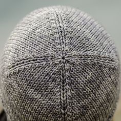 a close up view of a knitted hat