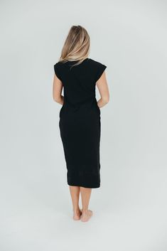 The Adeline manages to be both ultra-comfortable and ultra-chic, thanks to its midi length and structured shoulders that help create a gorgeous hourglass shape. It's perfect for casual outings or for a day at the office, and is a premium closet staple for year-round wear! Available in several colorways. FIT: Runs true to size. MATERIAL: 95% Acrylic 5% Spandex GARMENT DETAILS: Mini-ribbed knit dress in a midi length, with high neckline and structured cap sleeves. Features in-seam pockets. SIZE GU Casual Stretch Maxi Dress For Work, Chic Stretch Midi Dress For Loungewear, Black Midi Dress For Spring Loungewear, Black V-neck Midi Dress For Loungewear, Chic Black Maxi Dress For Loungewear, Casual Longline Dresses For Work, Stretch Midi Dress For Loungewear, Chic Longline Midi Dress For Daywear, Flattering Black Midi Dress