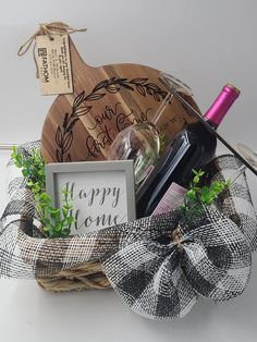 a basket filled with wine bottles and other items