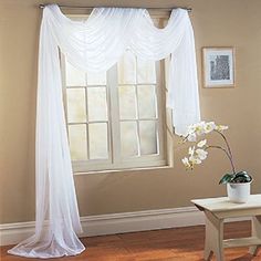 a painting of a window with white curtains and flowers on the table in front of it