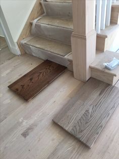 some wood floors and stairs in a house