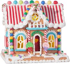 a gingerbread house is decorated with candy and candies