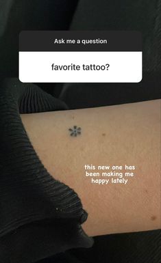 a person with a tattoo on their arm that says, ask me a question favorite tattoo?