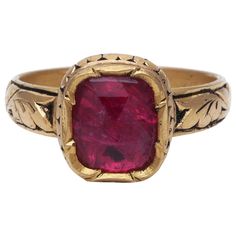 A ring with natural Ruby hand made in 18K Gold with intricate floral work on Gold. The work on Gold is a very old Indian technique called "Partash" which can be only done by hand. This gives the ring great detailing and makes it unique. Ring Size: US7.8 Traditional Oval Ring With 17 Jewels, Ceremonial Yellow Gold Emerald Heirloom Ring, Ceremonial Heirloom Yellow Gold Emerald Ring, Traditional Ruby Ring In Yellow Gold, Antique Ruby Signet Ring, Traditional Yellow Gold Ruby Ring With Gemstone, Victorian Yellow Gold Carved Rings, Victorian Carved Yellow Gold Rings, Antique 22k Gold Rings For Ceremonial Occasions