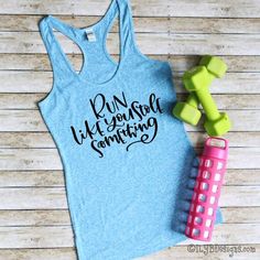 RUN LIKE YOU STOLE SOMETHING Workout Tank - Women's Funny Workout Tanks | ILYB Designs Cheap Workout Tops With Funny Text, Summer Workout Tank Top With Graphic Print, Tank T-shirt With Letter Print For Workout, Pink Graphic Print Tank Top For Workout, Workout Tanks With Sayings, Workout Tanks, Workout Humor