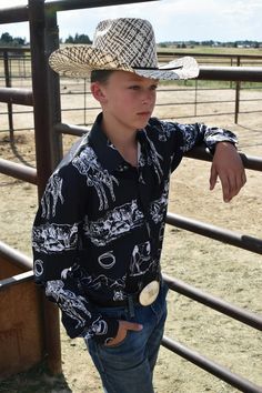 Our custom designed arena shirts are absolutely stunning and you won't find them anywhere else! Boast some serious style in this Unisex Western Button Up Shirt . Be rodeo-ready! Made from 100% polyester, lightweight and comfortable. Fabric has a slight sheen. This classic shirt provides a button-up style with long sleeves and chest pocket. Two buttons are included on each sleeve cuff to adjust a comfortable fit. PLEASE ALLOW UP TO 14 BUSINESS DAYS TO RECEIVE YOUR ORDER. Please calculate your siz Black Western-style Shirt For Western-themed Events, Black Long Sleeve Tops For Western-themed Events, Western Black Shirt For Ranch, Western Style Black Shirt For Ranch, Black Casual Shirt For Rodeo, Casual Black Shirt For Rodeo, Ranch Life, Sleeve Cuff, Plus Size Shopping