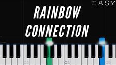 the words rainbow connection on top of an image of piano keys