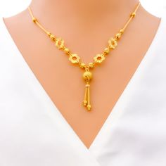 This 22k gold necklace, with a weight of 9.1 grams, showcases a charming cutwork flower design, beautifully rendered in a gleaming yellow gold finish. The necklace spans 17 inches in length, featuring a drop of 1.25 inches, and comes with 1 inch of adjustable links for a tailored fit, secured by an S lock. The intricate cutwork adds a touch of delicacy and elegance, making this piece perfect for those who appreciate the beauty of floral motifs combined with the luxurious appeal of gold. Ideal for adding a sophisticated and feminine touch to any outfit, this necklace is a testament to exquisite craftsmanship and timeless style. PRODUCT DETAILS Gold Purity(karat): 22k Gold Weight(grams): 9.1 Item Finish: Yellow Gold Necklace Length: 17" Drop Length: 1.25" Adjustable Links: 1" Links Lock Styl 22k Gold Flower Pendant Necklace Gift, Traditional Yellow Gold Flower Pendant Necklace, Gold Flower Pendant Necklace In 22k, Gold Necklace With 22k Gold Flower Pendant, 22k Gold Flower Pendant Necklace, 22k Yellow Gold Flower Pendant Necklace, 22k Gold Necklace, Yellow Gold Necklace, Floral Motifs