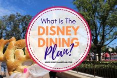 a person holding up some pretzels with the words what is the disney dining plan?