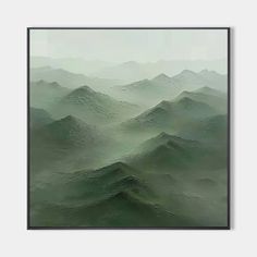 an abstract painting of green mountains in the foggy sky with black framed art print