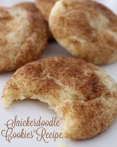 four cinnamon sugar cookies on a white plate