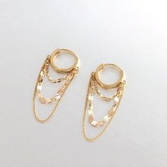 These earrings are crafted entirely from genuine 10k solid gold. They are hypoallergenic and nickel-free, making them suitable for sensitive skin. Lightweight makes them perfect for everyday wear. ★These earrings sold as a pair. ▷ Jewelry is packaged and shipped in a delicate jewelry gift box. ▷ If you are purchasing it as a gift, please feel free to add a personal note. ♡ Features  * Gold Kt: 10K solid gold * Available Gold Color: Yellow Gold * Hoop Inner Diameter Approx. 7mm.  * Total Earring Length: Approx. 27mm  * Stamped with 10K hallmark ♡ Shipping & Returns Orders placed Monday - Friday will ship within 3-7 business days. Please contact us if you need your order by a specific date. All orders over $300 require a signature upon delivery. Violet Gold Jewelry does not process or ship o Chain Hoop Earrings, 2 Earrings, Small Hoop Earrings, Gold Piece, Delicate Jewelry, Yellow Gold Chain, Jewelry Earrings Hoops, Earrings Dangle, Gold Hoop