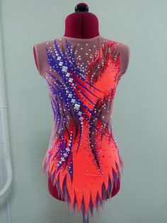 a woman's leotard with an artistic design on it