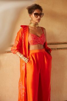 Tangy orange long jacket with floral embroidery. Paired with an inner padded blouse with floral embroidery and straight trouser. - Aza Fashions Paulmi And Harsh, Strappy Blouse, Silk Organza Fabric, Organza Jacket, Trouser Pattern, Dress And Jacket Set, Orange Jacket, Long Trousers, Floral Jacket