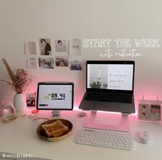 a laptop computer sitting on top of a desk