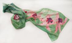 Hand painted silk scarf. Orchids silk scarf shawl. Large green scarf with light pink orchids. Spring scarves.Silk painting. MOthers Day gift. Floral scarves painted by hand. size is 17 by 70 inches 45 by 180 cm scarf painted on pure silk, ponge 6 Wash only by hand in cold water. All scarves in my shop are painted by hand only!!There's not any prints. MADE TO ORDER Silk scarves by me; http://www.etsy.com/shop/klaradar?section_id=6054911 Each and every purchased scarf is carefully gift wrapped. © Green Scarf As Spring Gift, Green Scarf For Spring Gift, Green Scarves For Spring Gift, Green Floral Print Scarf For Gift, Green Floral Print Scarves As Gift, Artistic Green Silk Scarf With Floral Print, Mothers Day Gif, Silk Scarf Painting, Hand Painted Silk Scarf