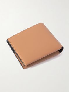 Loewe's background in leather craft dates back to mid-19th century Madrid. This billfold wallet is made from smooth leather that opens to reveal a black interior, generously fitted for eight cards. Loewe Logo, Edge Logo, Leather Billfold, Billfold Wallet, Leather Bifold Wallet, Card Holder Leather, Printed Leather, Black Interior, Wallet Men