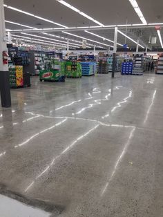 an empty grocery store filled with lots of items